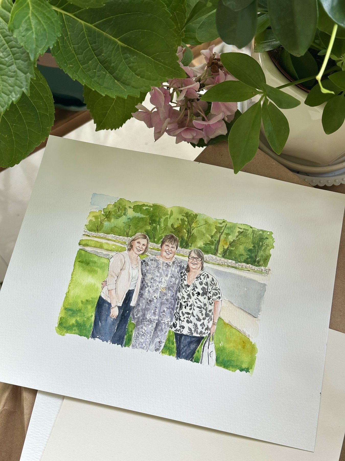 Finished watercolor portrait of three women in a family