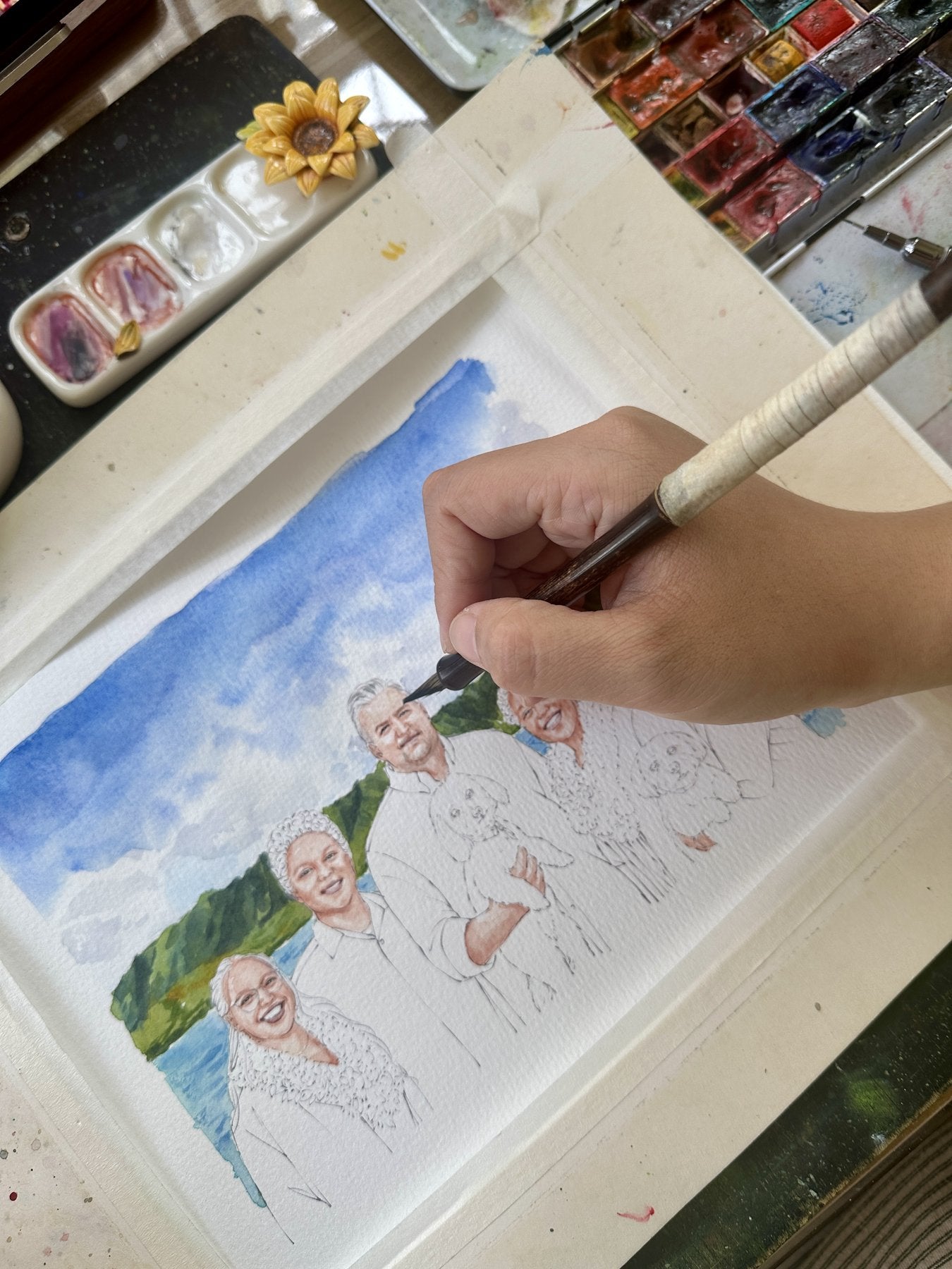 An island family watercolor portrait in progress