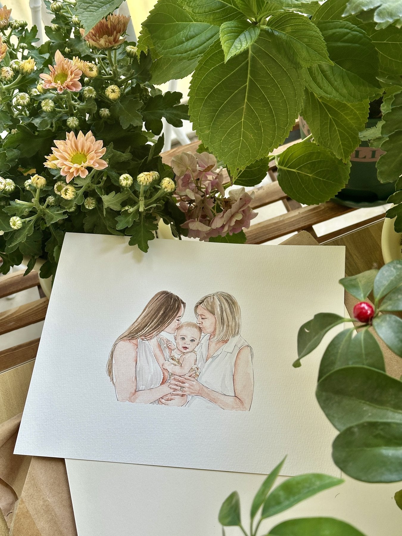 Finished hand-painted watercolor portrait of two women and a baby