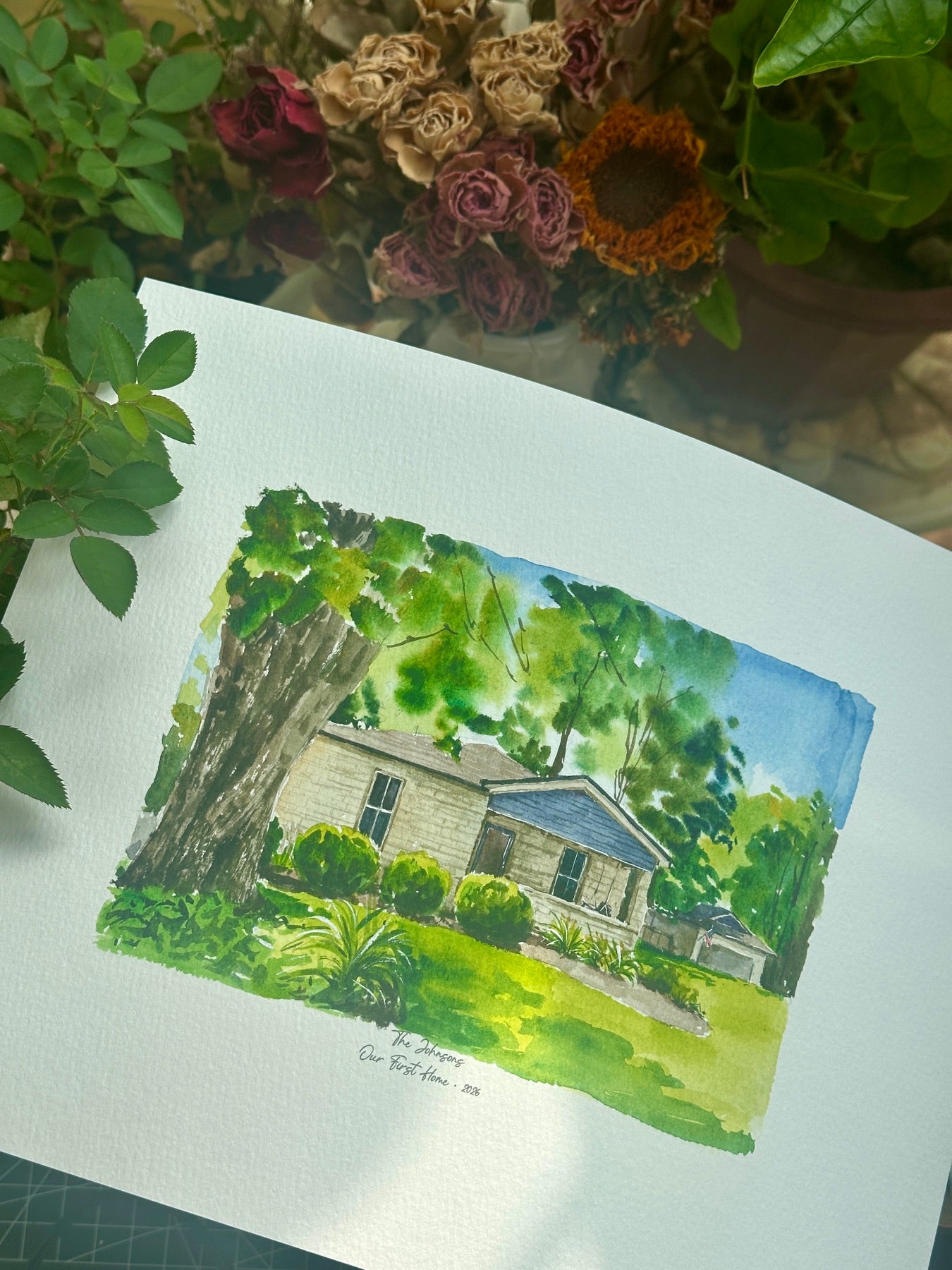 Finished hand-painted watercolor portrait of a single-story home with a blue gable