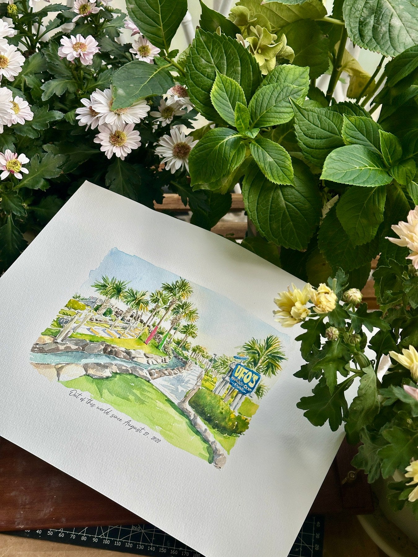 Tropical golf course and waterfront in a watercolor landscape