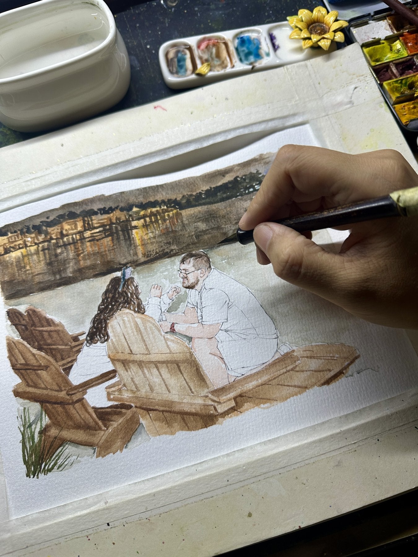 A lakeside couple watercolor portrait in progress